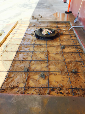 bringing the Packaged Metering Manhole installation up the surrounding surface grade