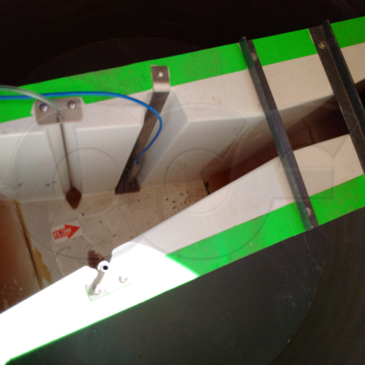 close-up of the bubbler tube - top left - pH probe holder - top right - and sampler tube - bottom left