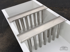 stainless steel Tranquilizer Racks mounted in the approach section of a fiberglass H-flume