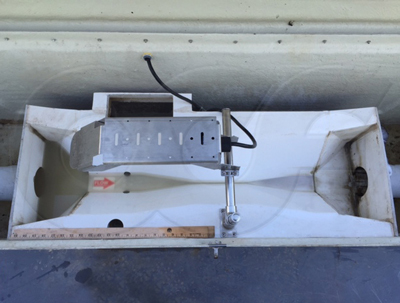 large 60 degree trapezoidal flume integrated into a fiberglass enclosure by Openchannelflow
