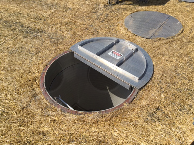 aluminum hatch top on a flow metering manhole