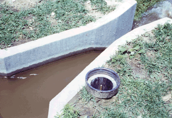 concrete Parshall flume with stilling well