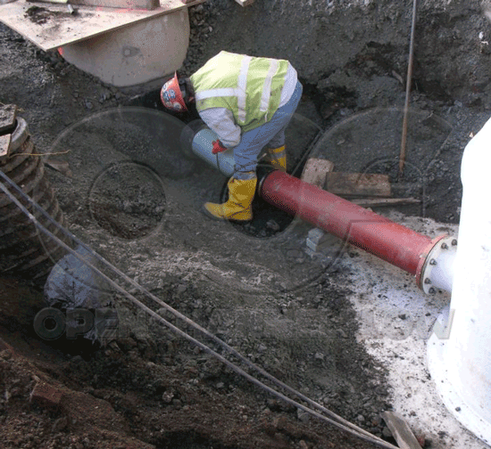 connecting fiberglass Metering Manhole to piping
