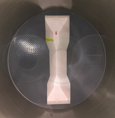 extra large trapezodial flume in metering manhole with staff gauge and benching