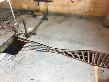 Parshall flume with ultrasonic transducer sensor mounted upstream of the point of measurement