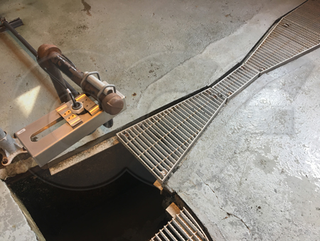 ultrasonic sensor mounted upstream of the point of measurement of the Parshall flume