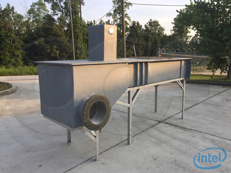 custom fiberglass H flume for industrial effluent monitoring on a stainless steel support stand