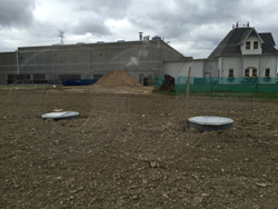 Flow monitoring manholes for industrial discharge compliance