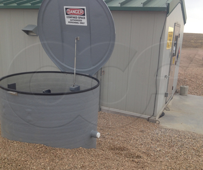 Fiberglass domed top manhole for measuring treated industrial effluent