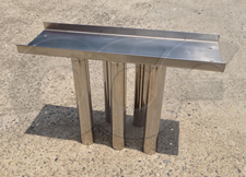 Large stainless steel Tranquilizer Rack for placement upstream of a Palmer-Bowlus Flume