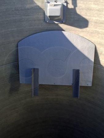 Manhole Equipment Shelf mounted in a Packaged Metering Manhole and stowed out of the operator's way