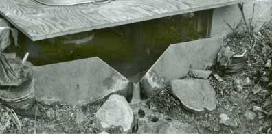 Thin-crested weir plate monitoring flow out of the abandoned Charter Oak mine