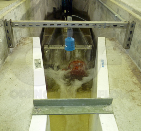 Parshall flume trying to measure turbulent effluent from a UV disinfection system