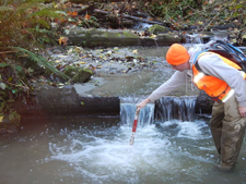 measuring the water level downstream of a rectangular weir