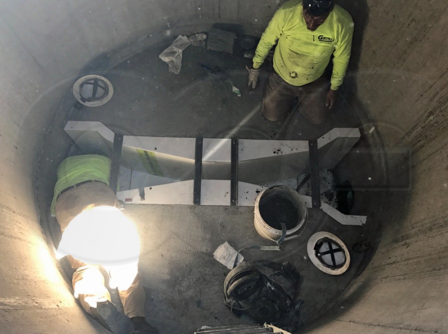 Installation of Fiberglass 9-Inch Parshall Flume with Staged End Adapters in a Concrete Manhole