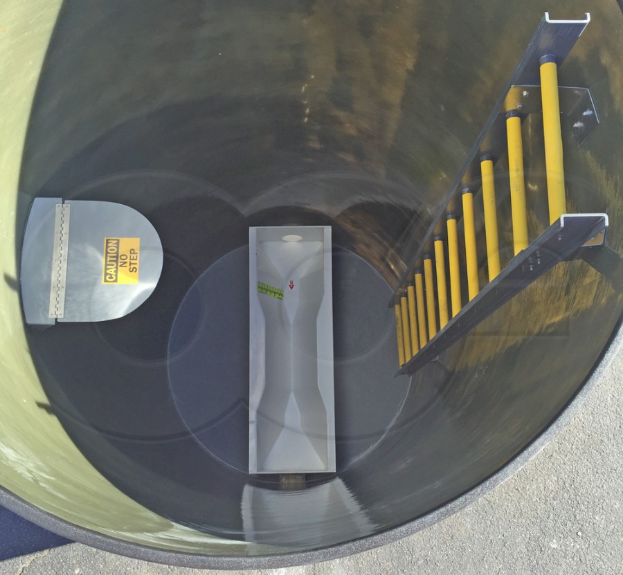 Fold-Up Equipment Shelf in a Flow Metering Manhole