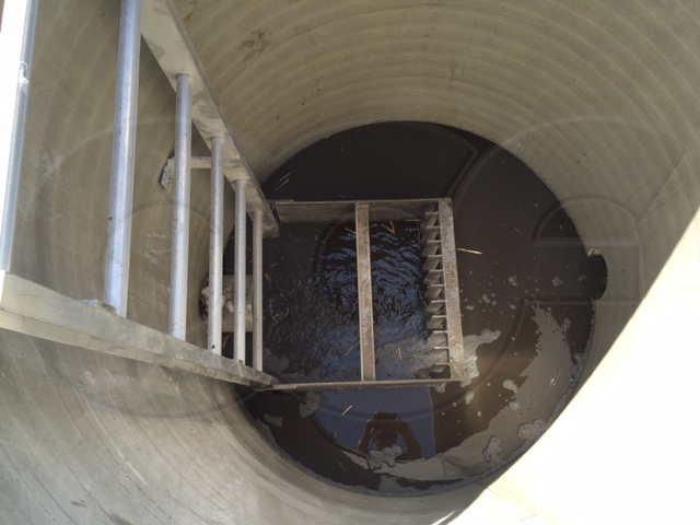 Fiberglass Screenings Manhole During Operation