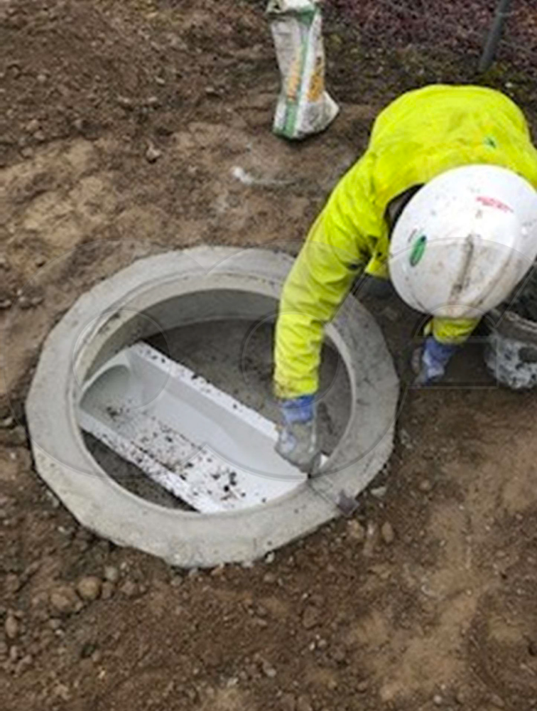 Installing a Grade Ring on a Traffic Style Flume Metering Manhole