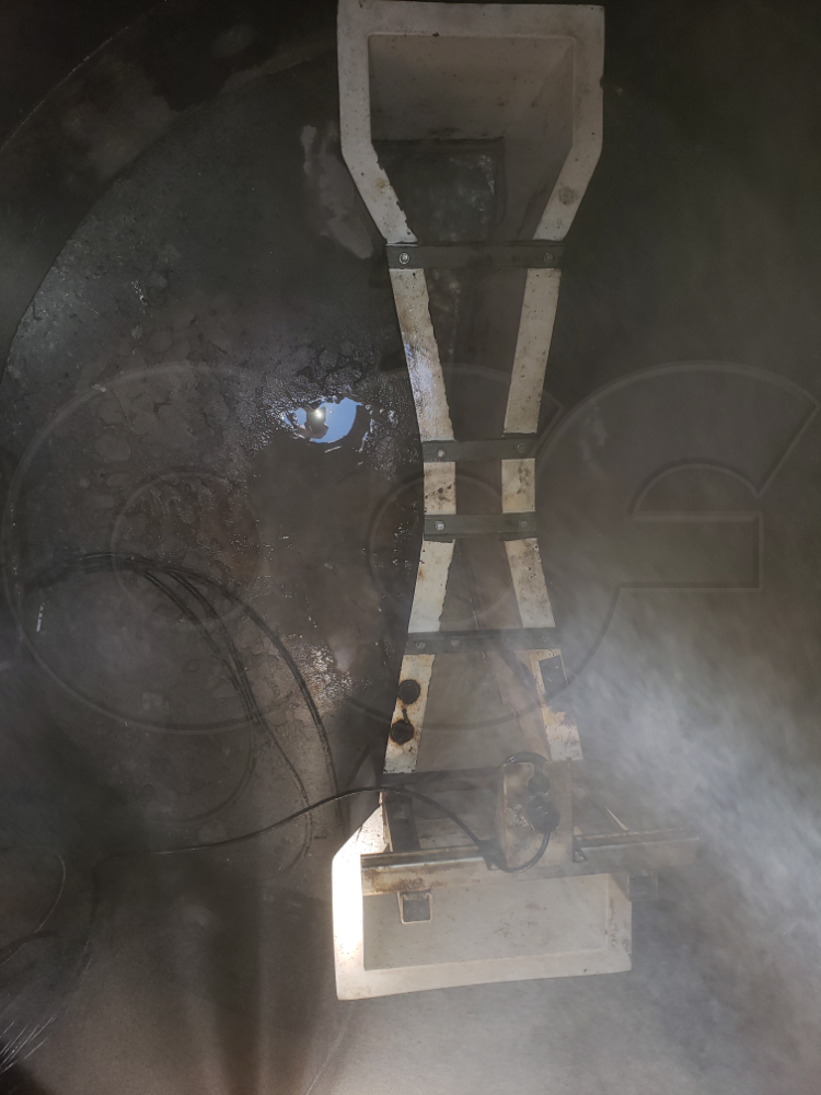 A Parshall Flume Measuring Steamy Flow in a Manhole