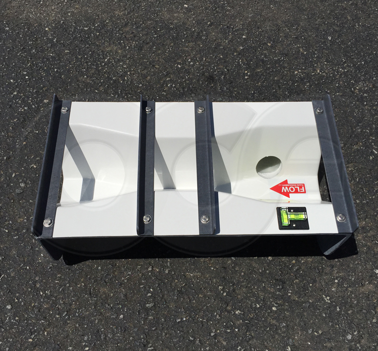 Stilling Well Coupling on a Small Trapezoidal Flume