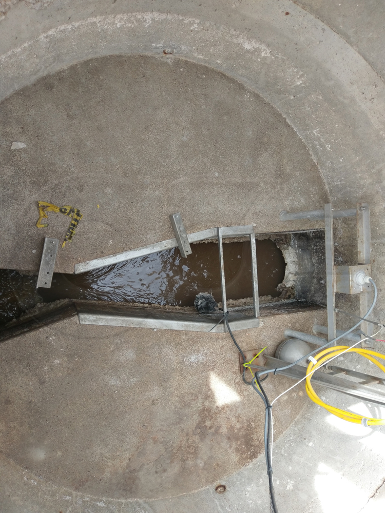Montana Flume in Concrete Manhole
