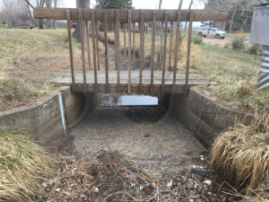 48-Inch Concrete Parshall Flume with Reduced Sidewalls Cast into Irrigation Ditch