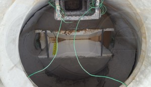 Extra Large Trapezoidal Flume Installed in a Concrete Manhole