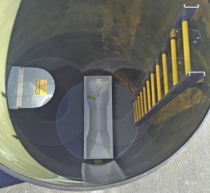 Fold-Up Equipment Shelf in a Flow Metering Manhole