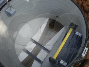 Concrete Shoulder Poured in a Metering Manhole