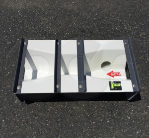 Stilling Well Coupling on a Small Trapezoidal Flume