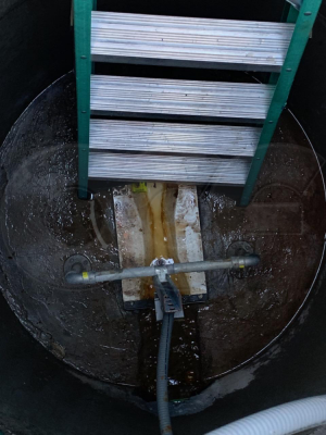 Backwards Trapezoidal Flume in Manhole