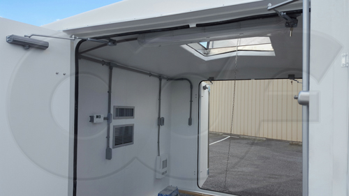 roof hatch mounted on a fiberglass building