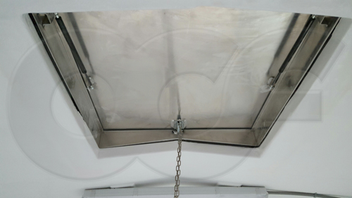 an interior view of an aluminum hatch mounted in the roof of a fiberglass equipment building - shelter