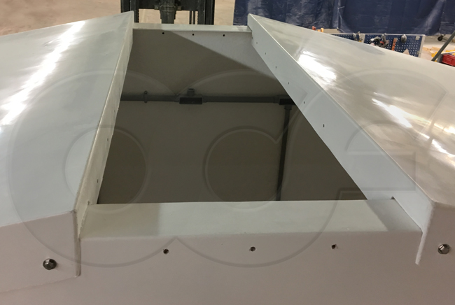 center section of the roof removed from a modular fiberglass equipment shelter building