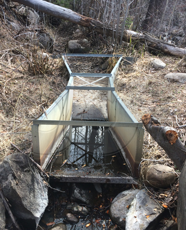 galvanized steel parshall flume measuring flwo through a natural open channel