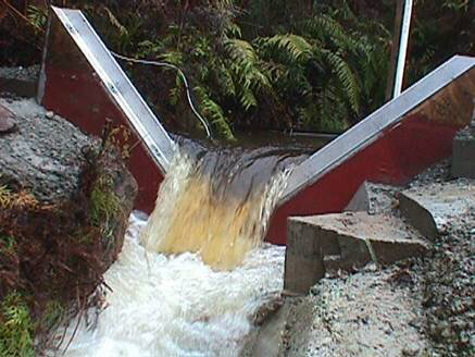 nappe flow over a V-notch weir crest